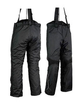 PANTALÓN DE CORDURA CON TIRANTES AJUSTABLES Y CREMALLERAS LATERALES